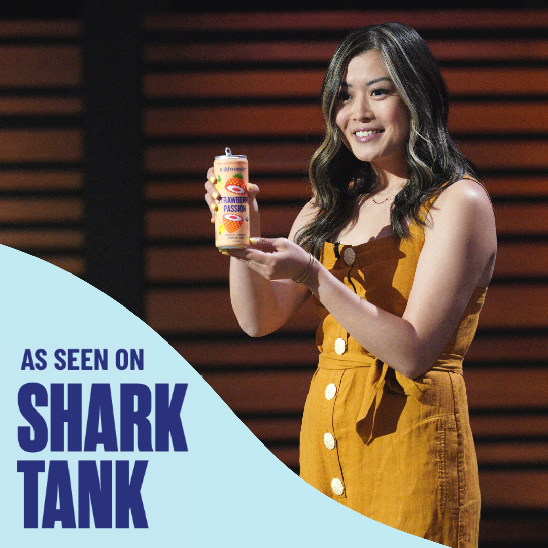 Rosa Li, wildwonder founder, holding a can of Strawberry Passion. "As Seen on Shark Tank" callout.